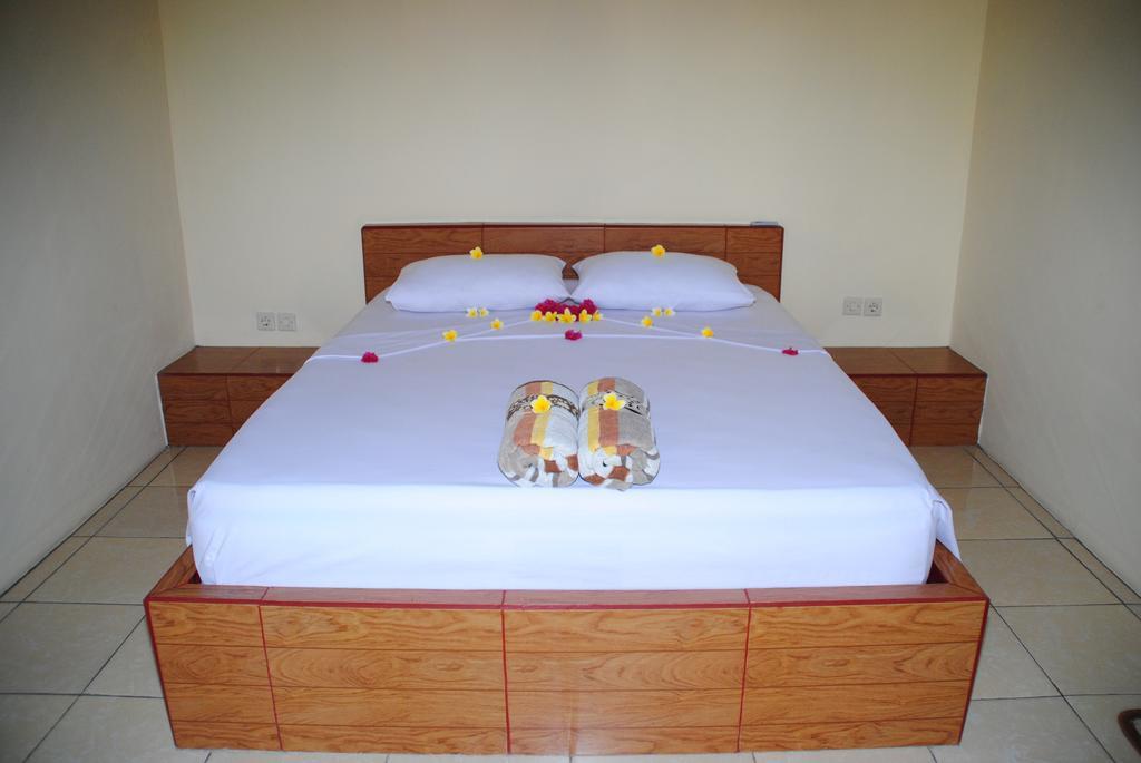 Kubu Sari Guest House Пемутеран Номер фото